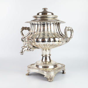 6735 A SHEFFIELD PLATED TWO-HANDLED HOT WATER URN